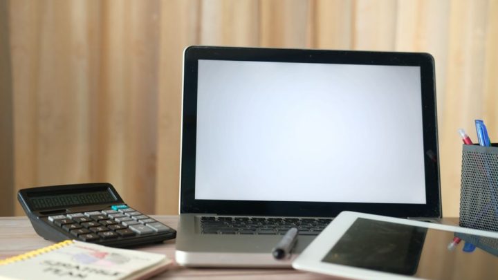 notebook pen sunny desk