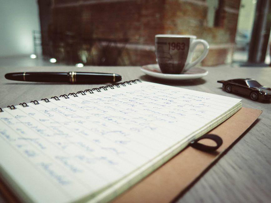 notebook pen cozy desk
